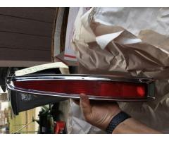 PAIR 90S CADILLAC DEVILLE TAIL LIGHT ASSEMBLIES AND BEZELS