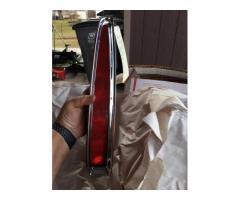 PAIR 90S CADILLAC DEVILLE TAIL LIGHT ASSEMBLIES AND BEZELS