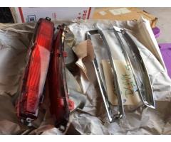 PAIR 90S CADILLAC DEVILLE TAIL LIGHT ASSEMBLIES AND BEZELS