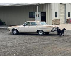 Set of Hubcaps on 63 Plymouth