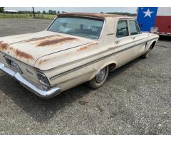 Set of Hubcaps on 63 Plymouth