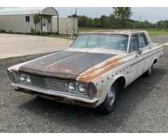 Set of Hubcaps on 63 Plymouth