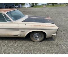 Set of Hubcaps on 63 Plymouth