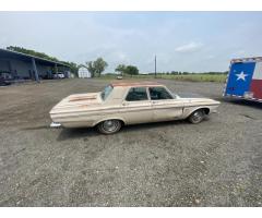 Set of Hubcaps on 63 Plymouth